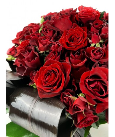 50 red roses  in a gigantic rose bouquet