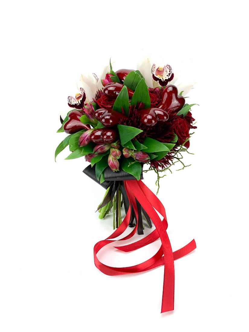 Round red bouquet with hearts and orchids