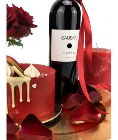 Gift package with red roses, a bottle of quality red wine, candle and a mini cake from Cake Shop