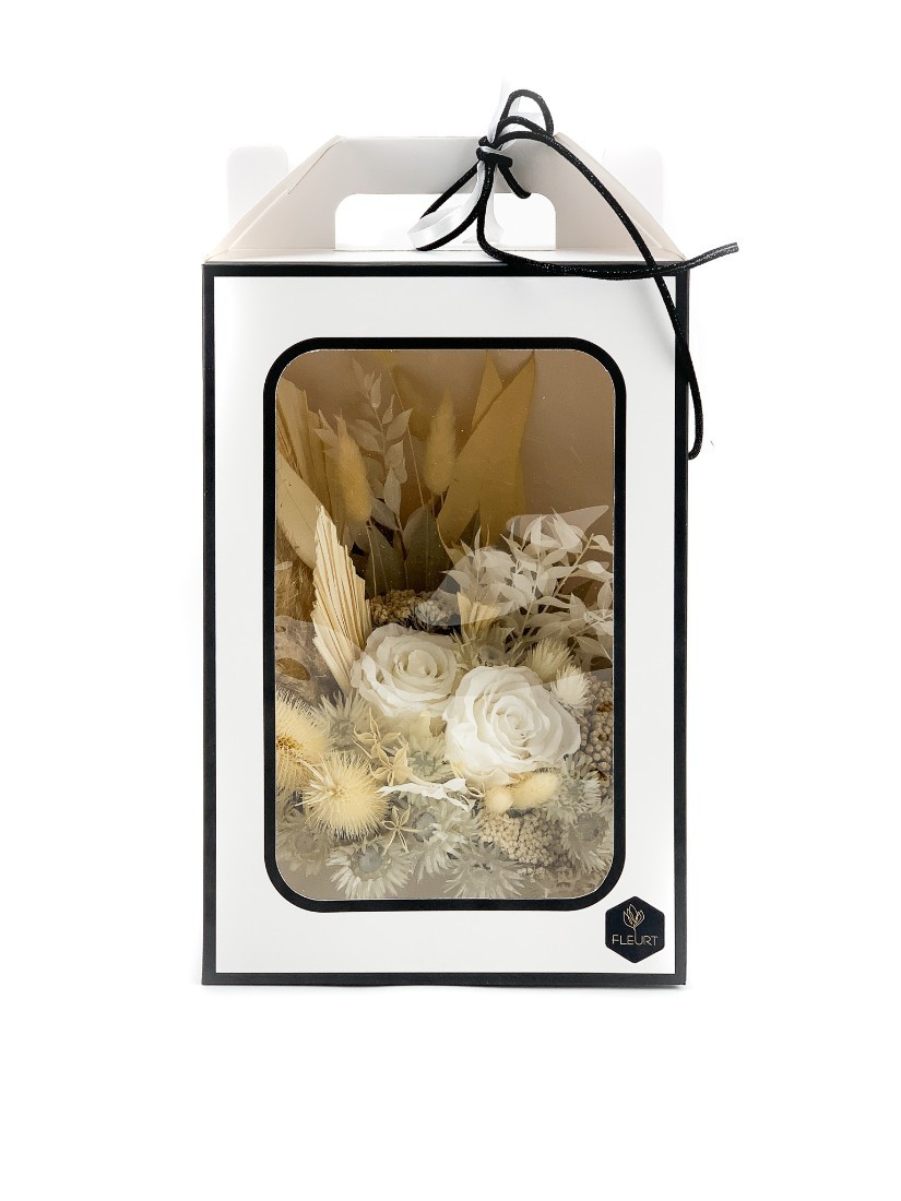 White dry flowers in elegant box